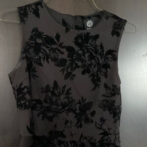Black velvet and fabric peplum sleeveless top